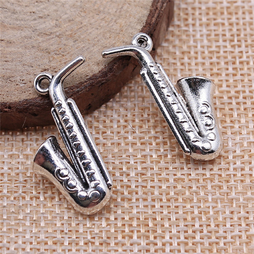 20 peças de pingentes de saxof - Musical Instrument Jewelry avaliação e preço